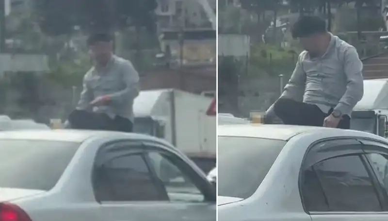 Trafikte Şaşkınlık Yaratan Olay: Otomobilin Üzerinde Alem Yapanlar!